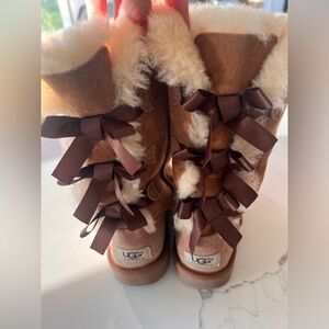Size 3 taller brown UGG boots with bows